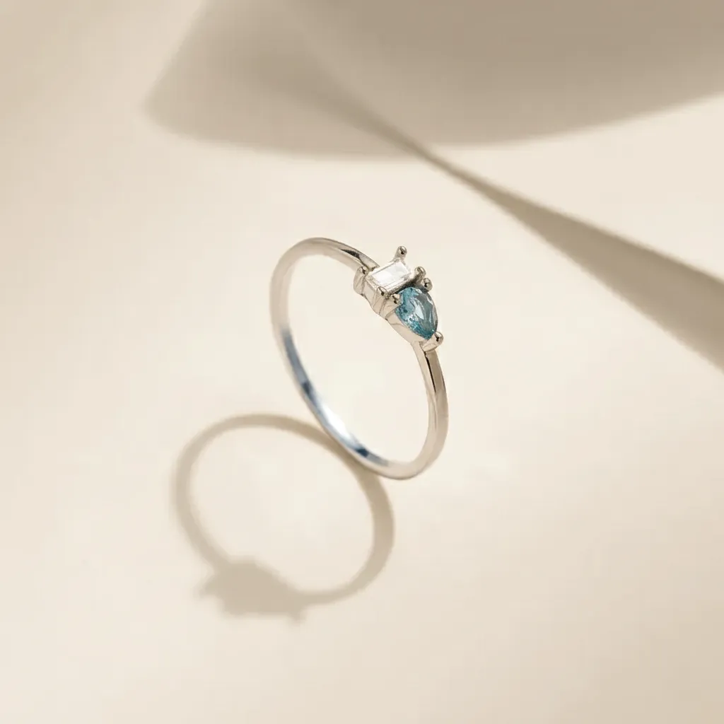 925 Silver Blue Pear-Shaped and White Rectangular Zircon Ring US 7, 5 g